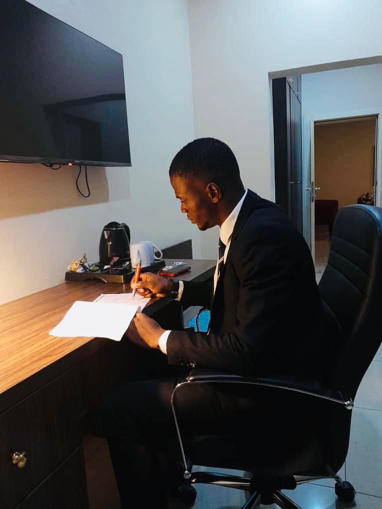 David S. Okeke in clergy attire